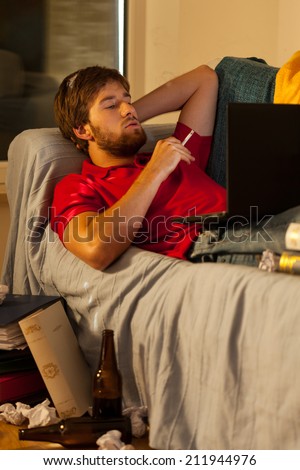 Lazy student's life during examination session at home