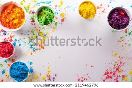 Happy Holi decoration, the indian festival.Top view of colorful holi powder on white background. Royalty-Free Stock Photo #2119462796