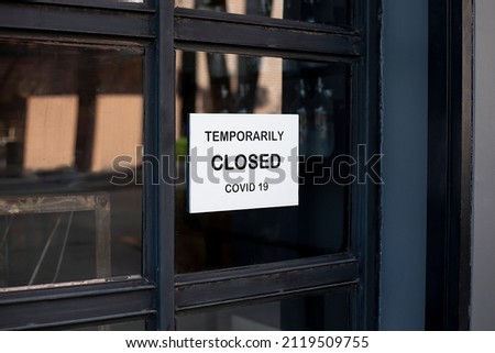 The sign in front of the office is temporarily closed. Royalty-Free Stock Photo #2119509755