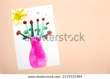 Child's drawing. Application of children's creativity. Kindergarten and craft school. The child drew a vase and flowers.