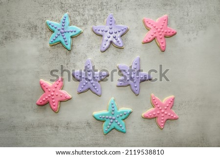 Star fish sugar cookies with royal icing for ocean or sea party theme.