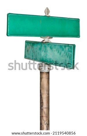 Two vintage green empty street name signs isolated on a white background