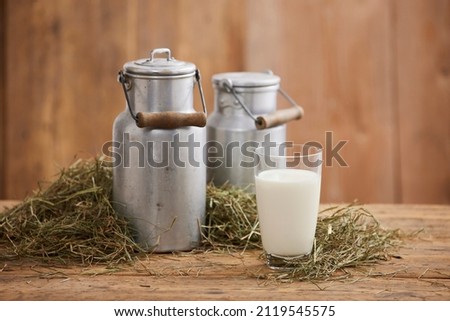 hay milk, milk, milk can, bio, milk glass, hay, farmer Royalty-Free Stock Photo #2119545575