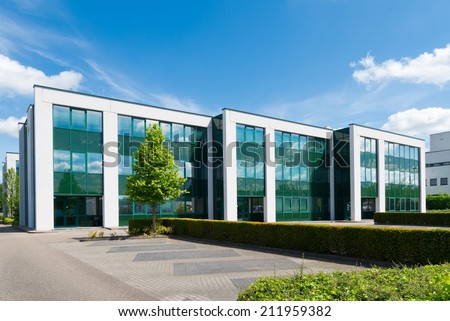 exterior of a modern office building Royalty-Free Stock Photo #211959382