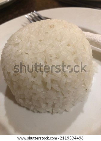 white rice on a white plate