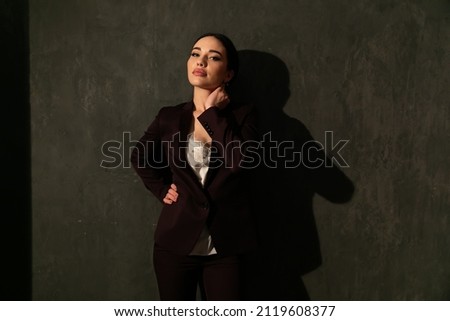business woman in a business suit at work in the office