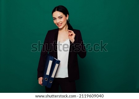 business woman in a business suit at work in the office