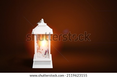 Beautiful lantern shining with light. Cemetery at night. Catholic Halloween tradition. Royalty-Free Stock Photo #2119623155