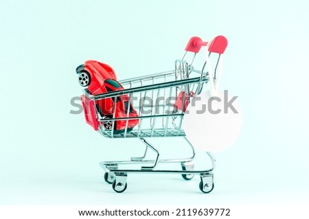 grocery cart and toy car, sale concept