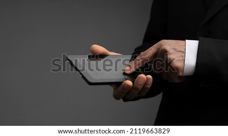 businessman making a mobile phone call in the office stock photo