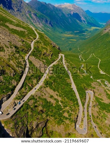 Trolls Path Trollstigen winding scenic mountain road with many cars, Norway Europe. National tourist route. Royalty-Free Stock Photo #2119669607