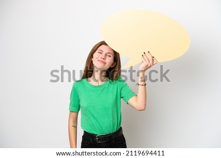 Young English woman isolated on white background holding an empty speech bubble