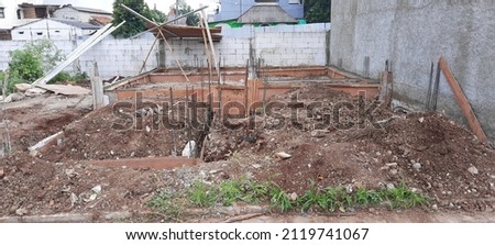The construction site of the house building foundation using hanging footplat (cakar ayam) method. Royalty-Free Stock Photo #2119741067