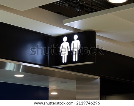 Male and Female toilet sign above the entrance