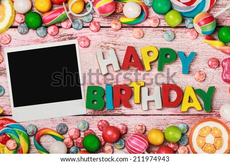 letters of cookies and happy birthday photo frame