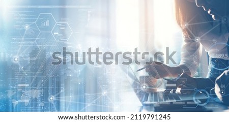 Business teamwork working on laptop computer at office with digital diagram, personal data, financial graph interfaces and internet network technology, futuristic virtual screen. business intelligence Royalty-Free Stock Photo #2119791245