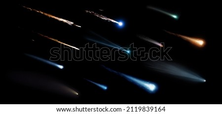 Collection of meteorites, asteroids, comets, meteors, comet tail isolated on a black background.  Elements of this image furnished by NASA. Royalty-Free Stock Photo #2119839164
