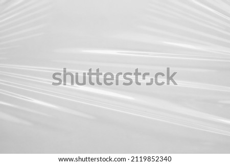 White transparent plastic film wrap texture background Royalty-Free Stock Photo #2119852340