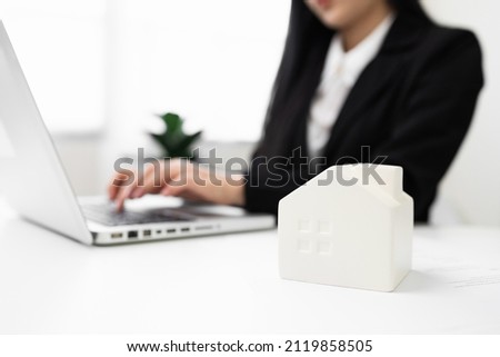 Close up hand business woman manager checking home loan documents reports papers company application form or registering claim, contract documents in office.