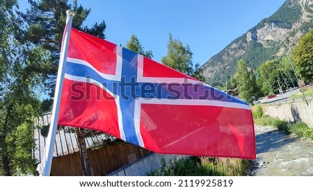 Norwegian flag flutters in the wind. High quality photo