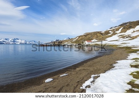 King Edward Beach Cove under snow, Former Grytviken whaling station, South Georgia, South Georgia and the Sandwich Islands, Antarctica Royalty-Free Stock Photo #2120017028