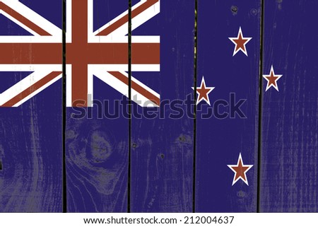 New Zealand flag on wooden background