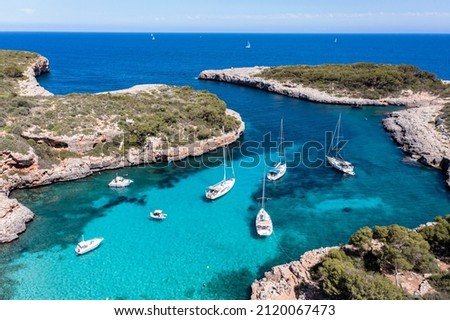 Aerial view, Cala Sa Nau, near Cala d'Or, with beaches and sailing boats, Migjorn region, Mallorca, Balearic Islands, Spain