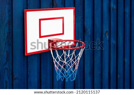 Outdoor Mini Basketball Hoop. Basketball Ring with Netball Royalty-Free Stock Photo #2120115137