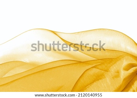 golden and white organza fabric macro wavy Royalty-Free Stock Photo #2120140955