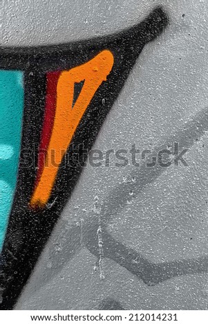 Creative arts background stone age textured wall painted with colored inks. Abstract graffiti. blue black gray green orange color