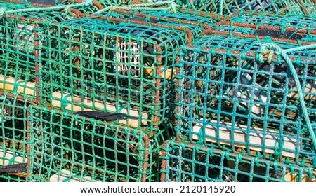 Close up of lobster and crab fishing cages piling up