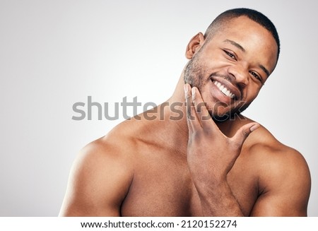 Grooming greatly improves your physical appearance. Studio portrait of a handsome young man posing against a white background. Royalty-Free Stock Photo #2120152274