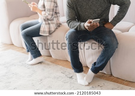 Phone gadget addicted addiction. Spouses husband and wife couple divorce, arguing, having marriage problems. Misunderstaning between partners. Psychology therapy. Cheating, abuse in relationship Royalty-Free Stock Photo #2120185043