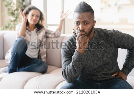 African wife and husband arguing crying misunderstanding between partners.Marriage problems, abuse, cheating. Spouses couple divorce. Psychology therapy. Scandal Royalty-Free Stock Photo #2120201054