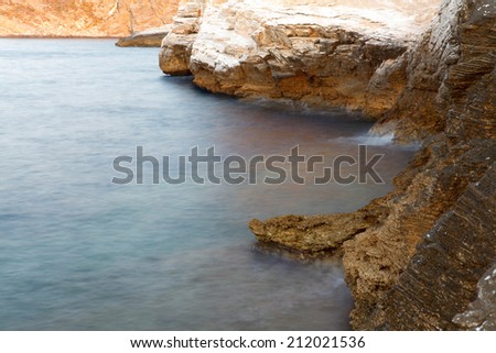 Aegean shore in Greece, Thassos island - waves and rocks - long exposure photography 