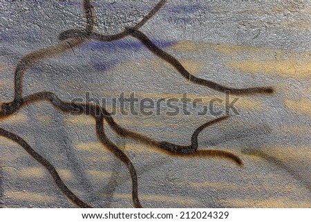 Creative arts background stone age textured wall painted with colored inks. Abstract graffiti. yellow gray blue brown color. pattern branch
