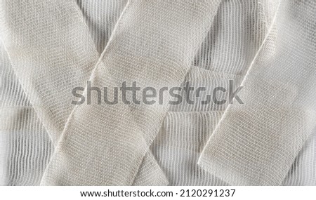 Medical bandage background and texture, top view Royalty-Free Stock Photo #2120291237