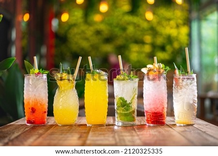 different types of tropical cocktails, summer style tiki bar drinks Royalty-Free Stock Photo #2120325335