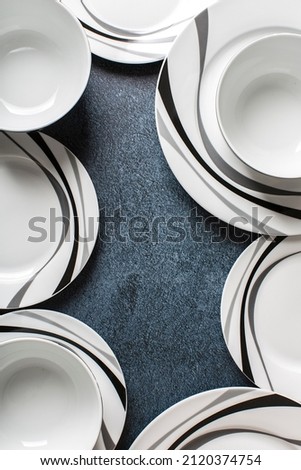 Beautiful bowls and plates on dining table with copy space