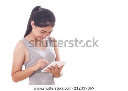 Young women using tablet pc on white background