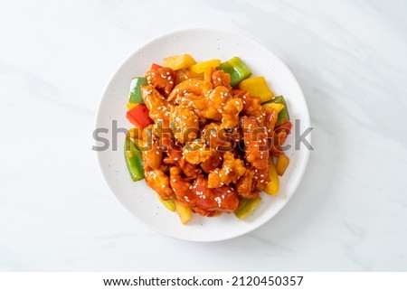 fried crispy chicken with sweet and sour sauce in Korean style Royalty-Free Stock Photo #2120450357