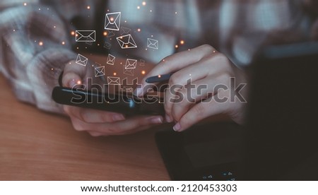 Businessman hand using smartphone with email sent out icon communication business technology texting by phone