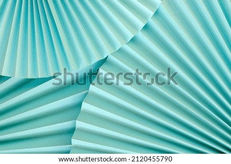 Template with paper fans. Mockup for product presentation, advertising, design with copy space. Blue, Spun Sugar, Glacier Lake background. Flat lay, top view. Royalty-Free Stock Photo #2120455790