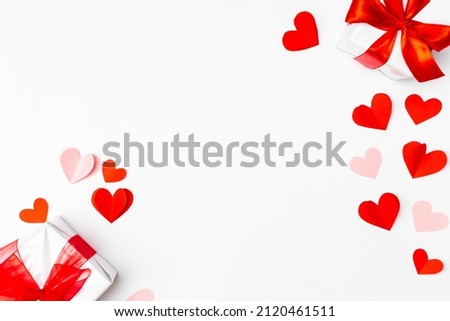 Valentine's Day background. Gifts, hears on white. Concept of love, affection. Holiday card.