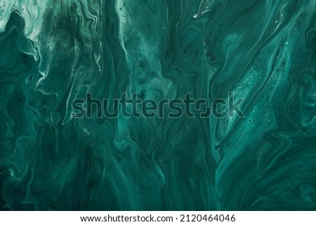 Fluid Art. Liquid Velvet Jade green abstract drips and wave. Marble effect background or texture Royalty-Free Stock Photo #2120464046