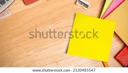 Image of memo note with copy space on desk. national clean your desk day concept digitally generated image.