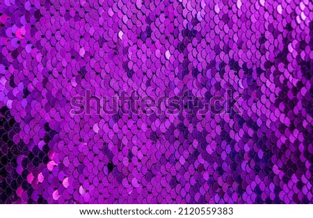 Colorful sequins sparkling background. Texture of sequins. High quality photo