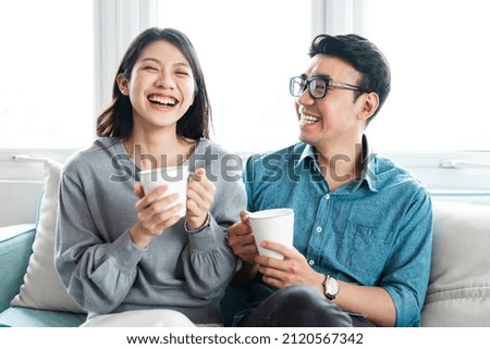 asian couple pictures at home Royalty-Free Stock Photo #2120567342