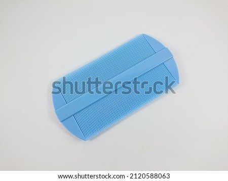 Lice comb for combing out lice from hair,isolated on white background