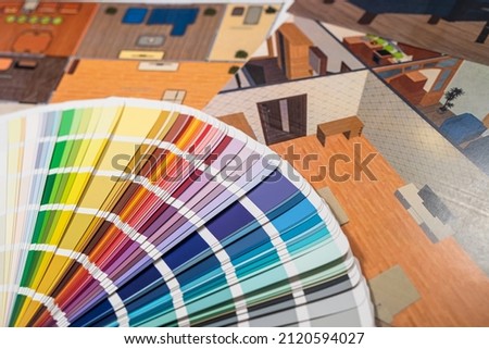 Architectural design of work with color palette and sketch plan printed on a large sheet. Design concept